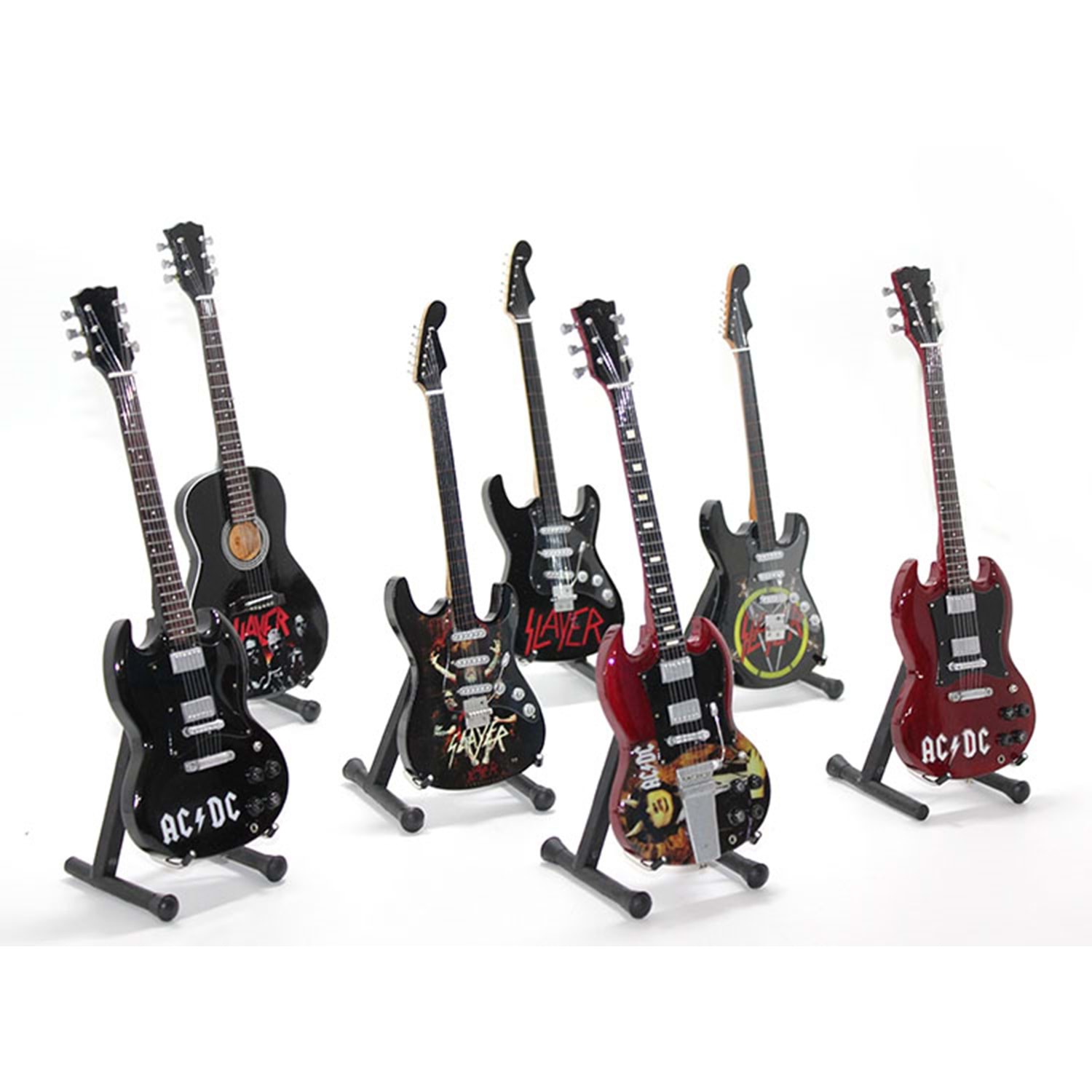 Dekoratif Ahşap Gitar - Küçük Boy (23x7.5 cm) Dekoratif Ahşap Gitar, küçük boyutuyla minimalist bir dekorasyon parçası arayanlar için ideal bir seçenektir. 23 x 7.5 cm ölçülerindeki bu zarif obje, ahşap malzemeden üretilmiş olup estetik tasarımıyla göz alıcı bir görünüme sahiptir. Evinizde, ofisinizde veya özel bir köşede nostaljik bir hava yaratmak için mükemmeldir. Şık ve kompakt yapısıyla her alanda kolayca sergilenebilir. Ayrıca müziksever dostlarınız için anlamlı bir hediye alternatifi sunar.